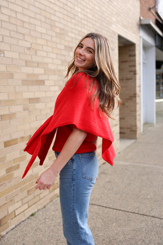 Women’s Cable Knit Keyhole Wrap in red – versatile knit shawl with tapered silhouette.