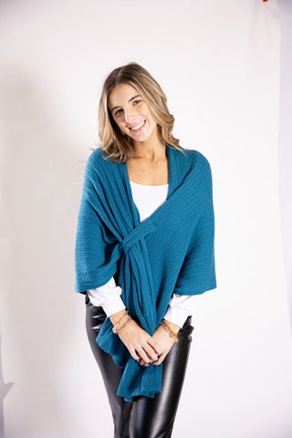 Model in teal Cable Knit Keyhole Wrap – chic cable knit topper for all occasions.