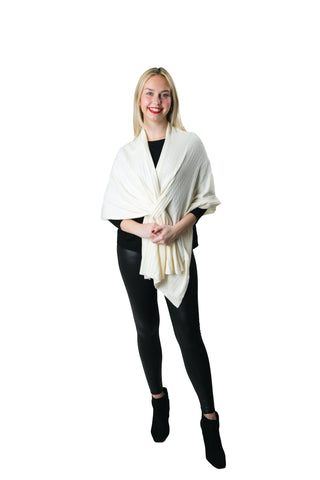 Model wearing the Cable Knit Keyhole Wrap in white – soft cable knit shawl with keyhole closure.