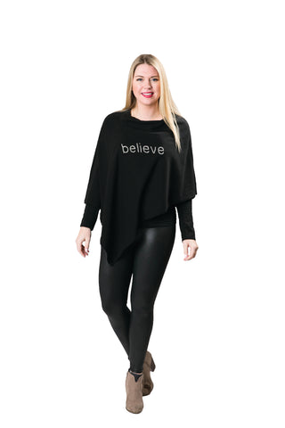 Black knit poncho with believe in silver sequins