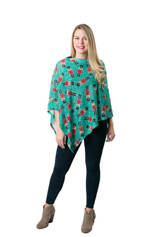 Emily poncho with nutcrackers printed on green