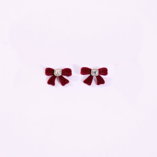 Red velvet bow earrings with crystal center – playful holiday stud jewelry
