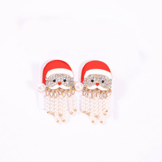 Close-up of festive Santa earrings with rhinestones and beaded fringe