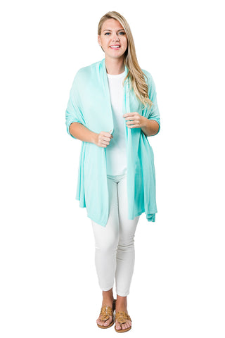 Woman wearing aruba blue colored shawl