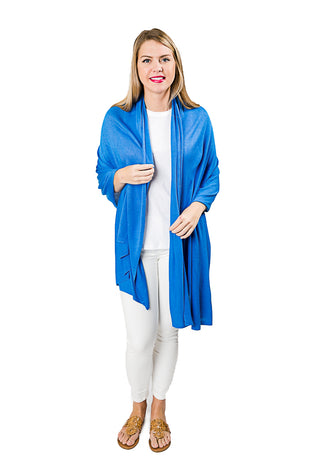 Woman wearing azure blue colored shawl