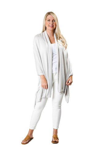 Woman wearing metallic silver colored shawl