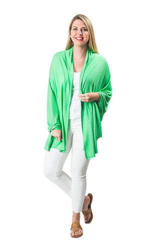 Woman wearing spearmint green colored shawl