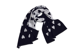 reversible black scarf with white hearts reverses to white with black hearts with eyelash fringe
