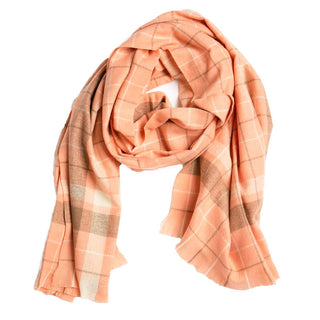 Light orange plaid with white and gray scarf.