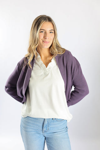 women wearing cardigan and white tank top