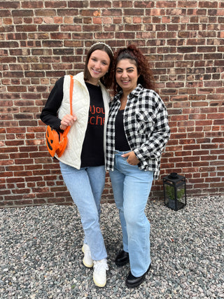 Two girls posing in fall attire