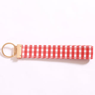 Red and white gingham keychain with gold key ring 