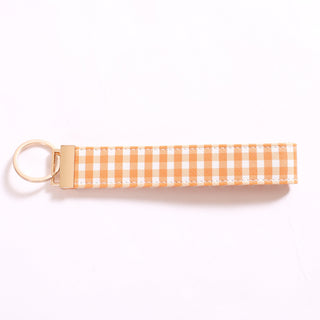 Orange gingham keychain with gold key ring 