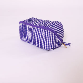 Royal blue gingham glam bag with zipper top – perfect for gameday or travel.