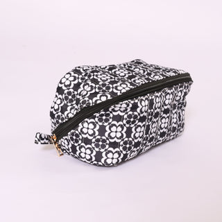 black geometric floral printed glam bag with zipper