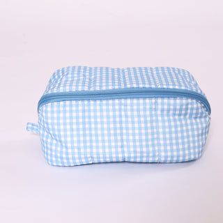 Blue and white gingham fold flat toiletry bag with  zipper