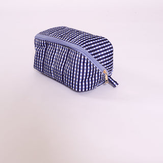 Navy blue gingham glam travel makeup bag with zipper – gameday essential.
