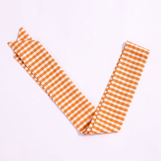 Burnt orange gingham twillie ribbon scarf for hair or bag accessory.