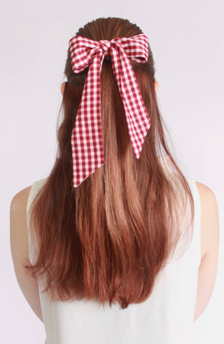 Maroon Gingham Twillie styled in a womans hair