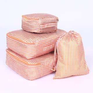 Set of checkered burnt orange packing cubes