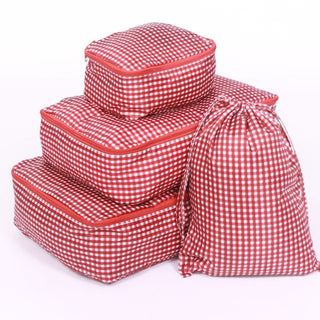 Set of red and white checkered storage bags on a white background