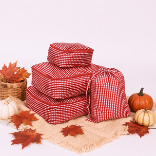 Set of maroon and white checkered packing cubes