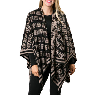 Camel and black reversible Greek key print ruana in buttery soft cashmere-like knit, shown reversed