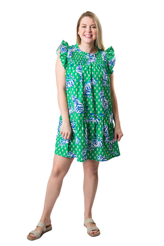 Above the knee, green with blue tiger print dress with cap flutter sleeves, smocked above the chest