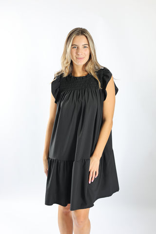 Woman wearing black dress