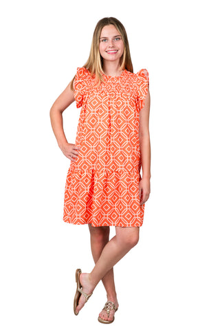 Above the knee dress with cap flutter sleeves, smocked above the chest with orange 