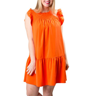 Smocked, tiered dress in Orange