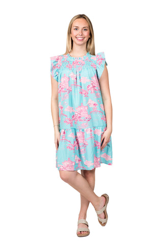 Above the knee dress with cap flutter sleeves, smocked above the chest with turquoise and pink garden