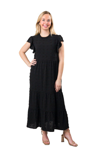 Woman wearing a black dress on a white background