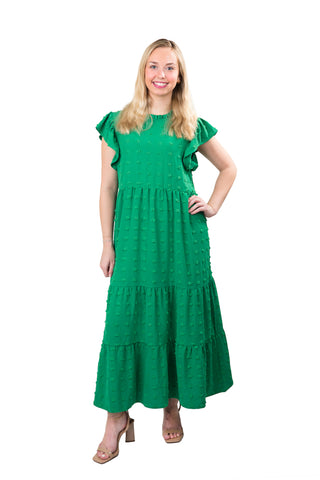 Woman wearing a green dress on a white background