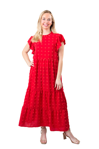 Woman wearing a red dress with a white background