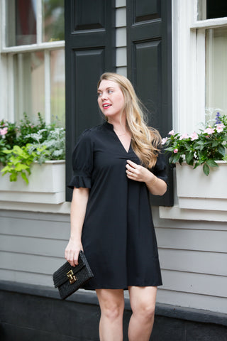 Woman wearing black dress 