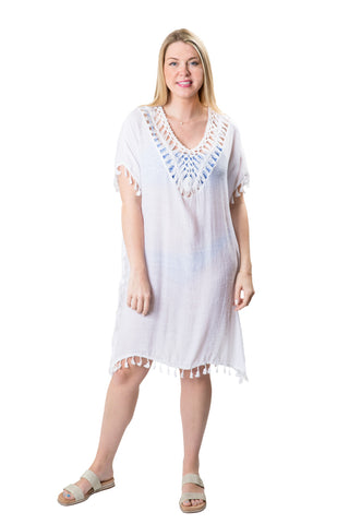 White Cassandra cover-up with tassel on hems and sleeves, open knit v-neck-line and side slits