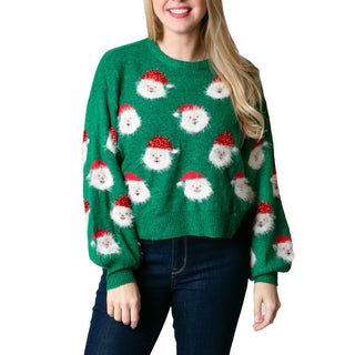 Green sweater with Santa faces