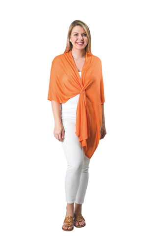 Woman wearing an orange keyhole-closure wrap