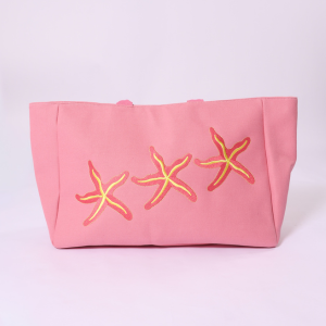 Pink bag with starfish designs 