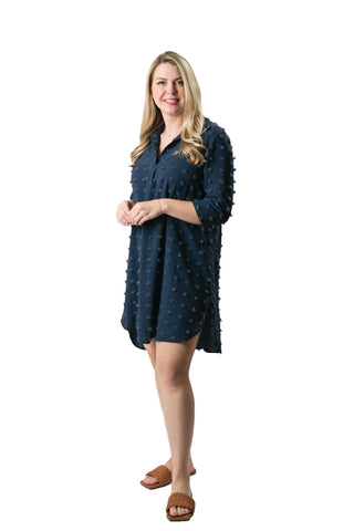 Navy Carmella Tunic Dress with feminine swiss dot pom fabric, perfect for summer.