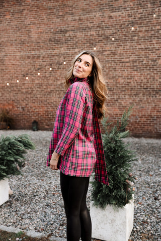 Pink Plaid Cecily Swing Blouse – Woman wearing pink plaid Cecily Swing Blouse with tie neck and keyhole back.