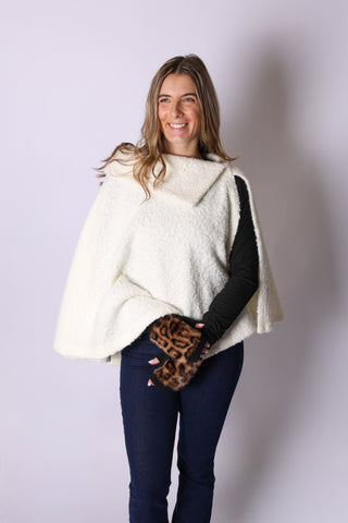 Woman wearing white Kristen Cape 