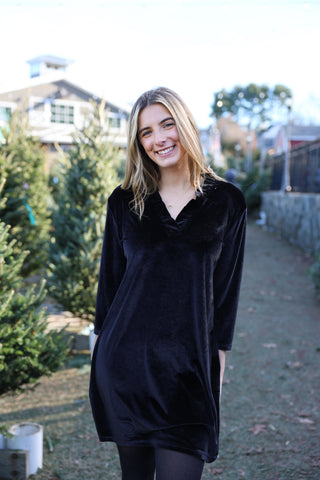 Women wearing black velvet dress