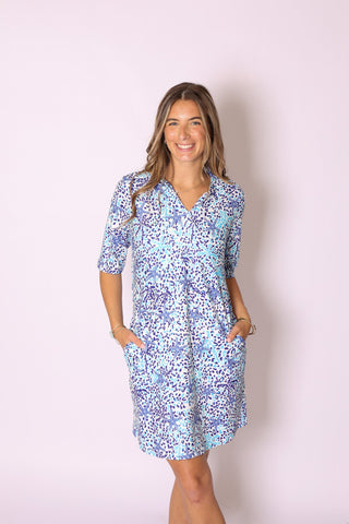 Sage Dress in coastal-inspired blue and purple starfish print, lightweight and breezy design.