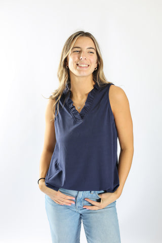 Woman wearing navy blue top