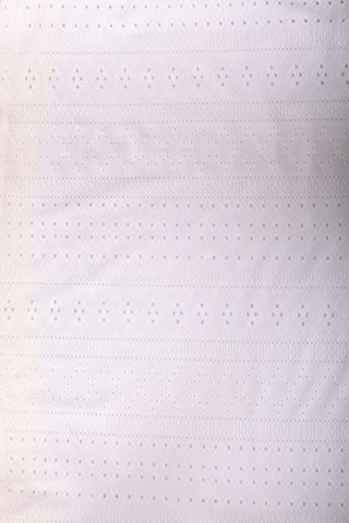 Swatch of the Goldie Eyelet Top in white.