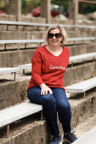 women wearing red gameday sweater 