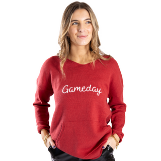 Crimson sweater with white gameday lettering and pockets