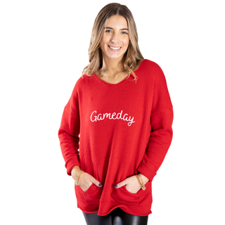Red sweater with white gameday lettering and pockets